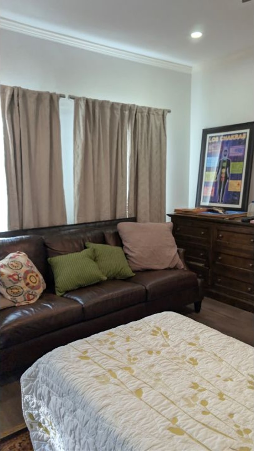 A quiet treatment room prepared for spiritual wellness sessions at Madre Tierra